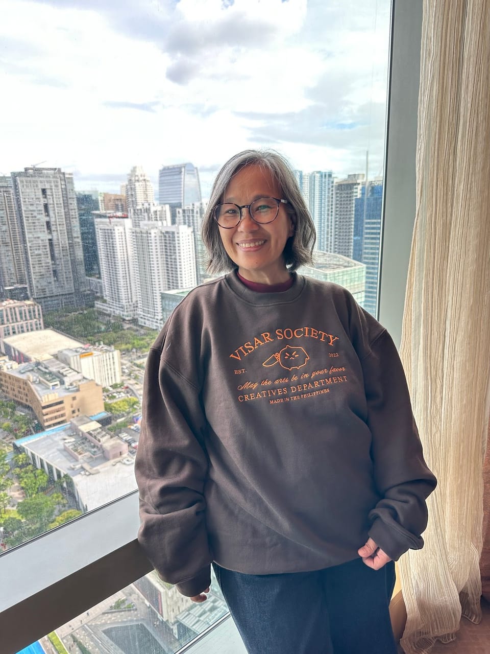 Melo de Leon wearing an SB19 sweater.